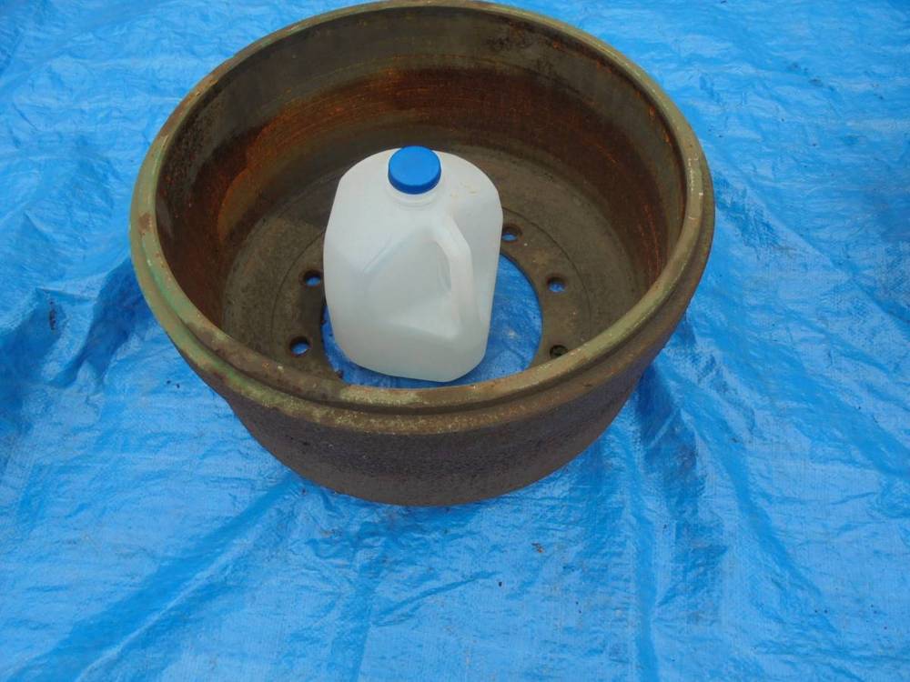 Repurposing old semitruck brake drums as flower pots. in the Tools