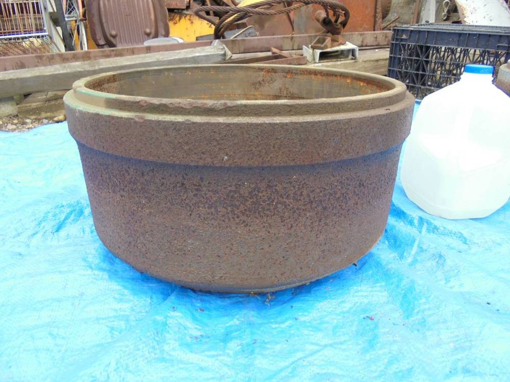 Repurposing old semitruck brake drums as flower pots. in the Tools