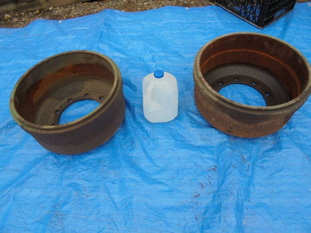 Repurposing old semitruck brake drums as flower pots. in the Tools